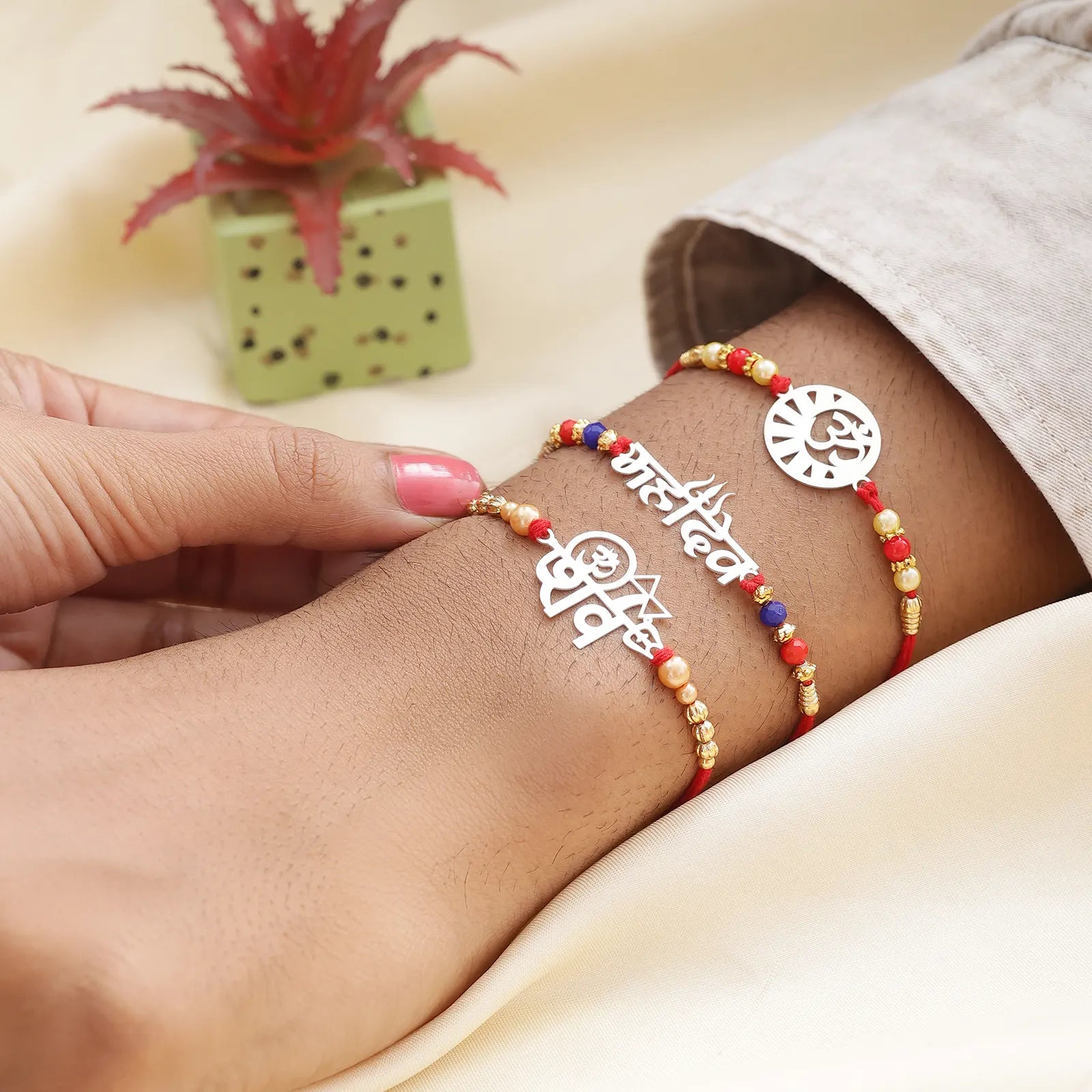 Om Silver Rakhi for Brother (Pack of Three)