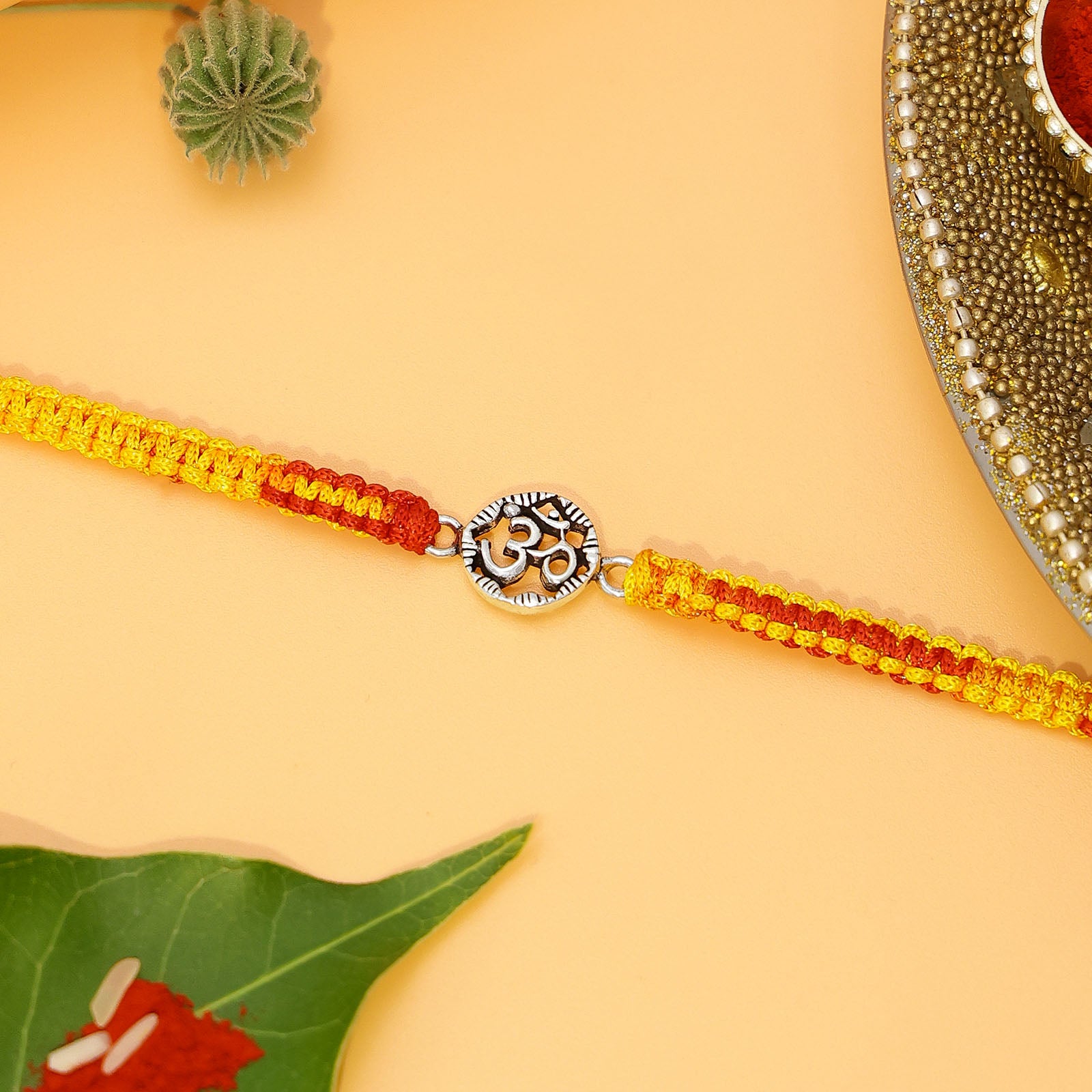 Om Symbol Silver Rakhi - Tweov Jewels