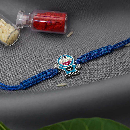 Original Silver Rakhi - Pure 925 Silver Kids Rakhi &#8211; Doremon on Blue Knotted Thread