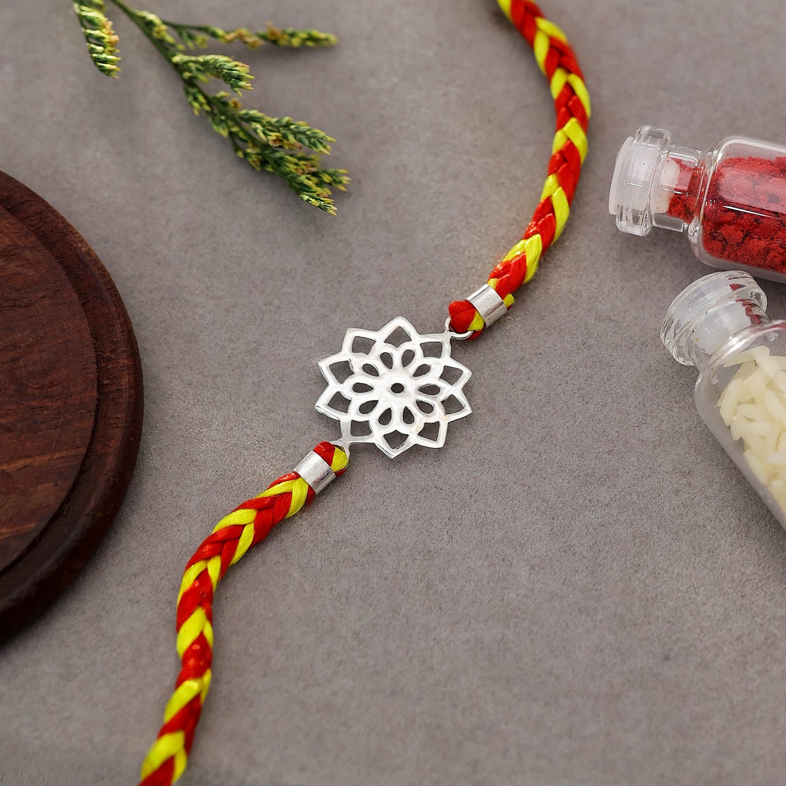Original Silver Rakhi - Pure Silver Flower Charm Rakhi &#8211; Elegant Thread Delight