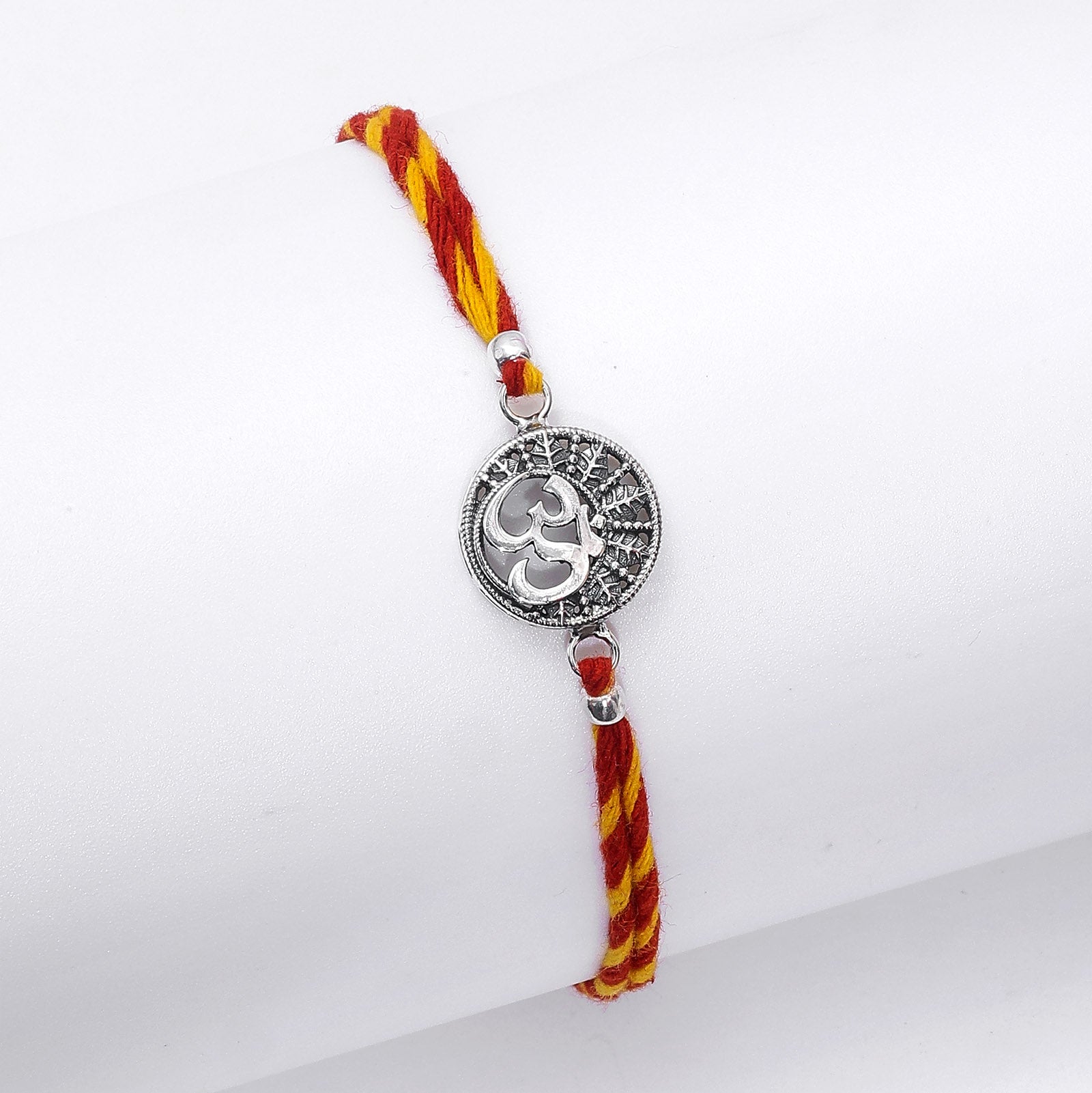 Pure Silver Rakhi - Eternal Serenity of Om with Carved Leaf - Tweov Jewels